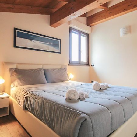 Appartamento Al Porto Pianello Del Lario Bagian luar foto